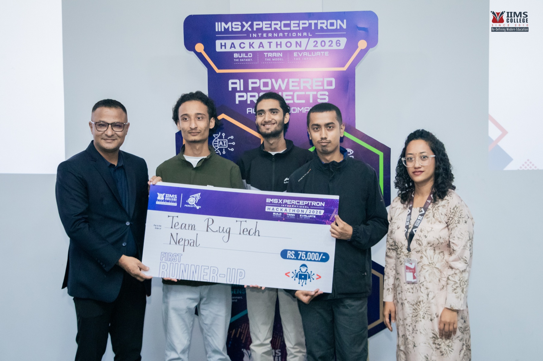 Team Rug Tech holding the first runner-up cheque