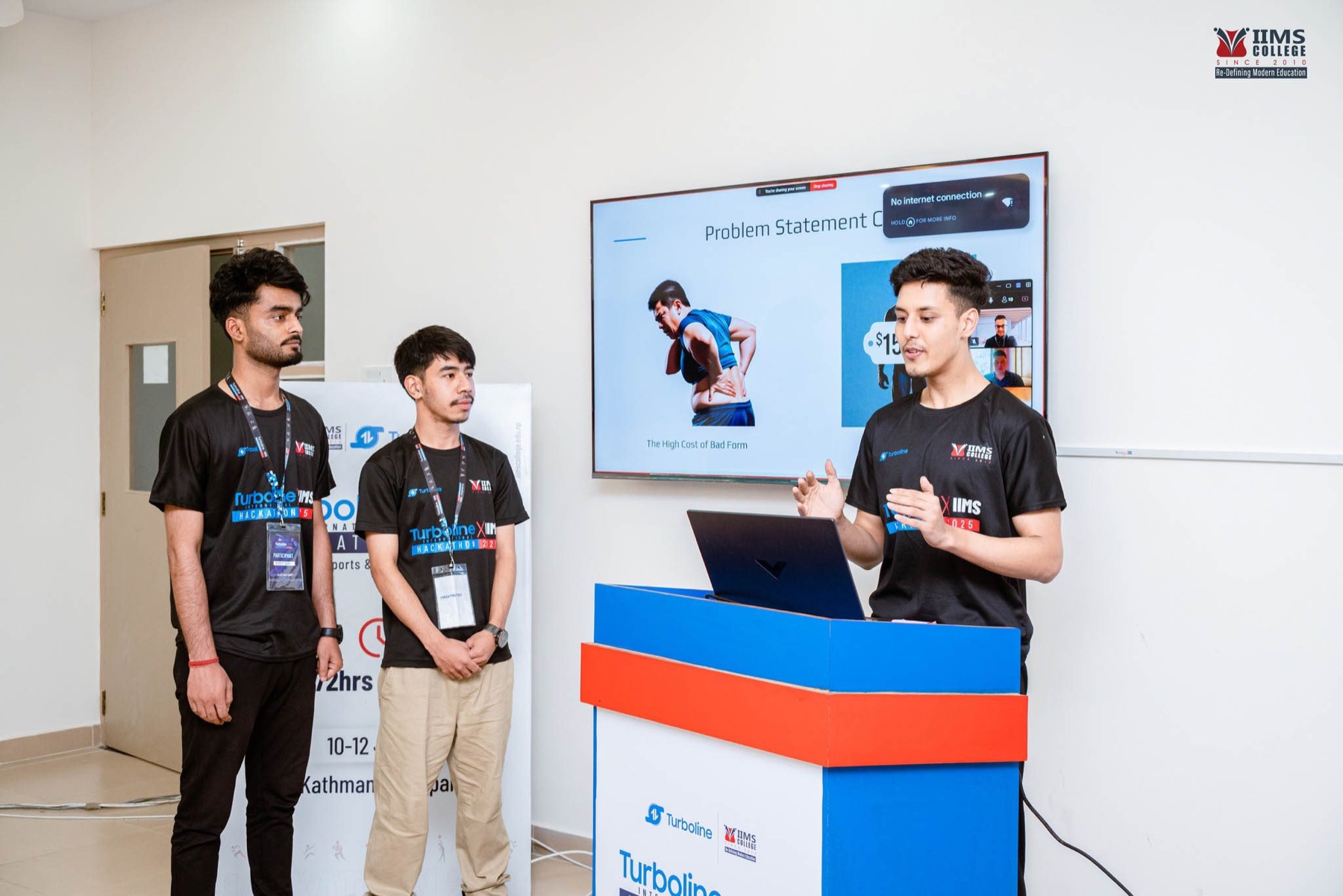 A team presenting its work to judges